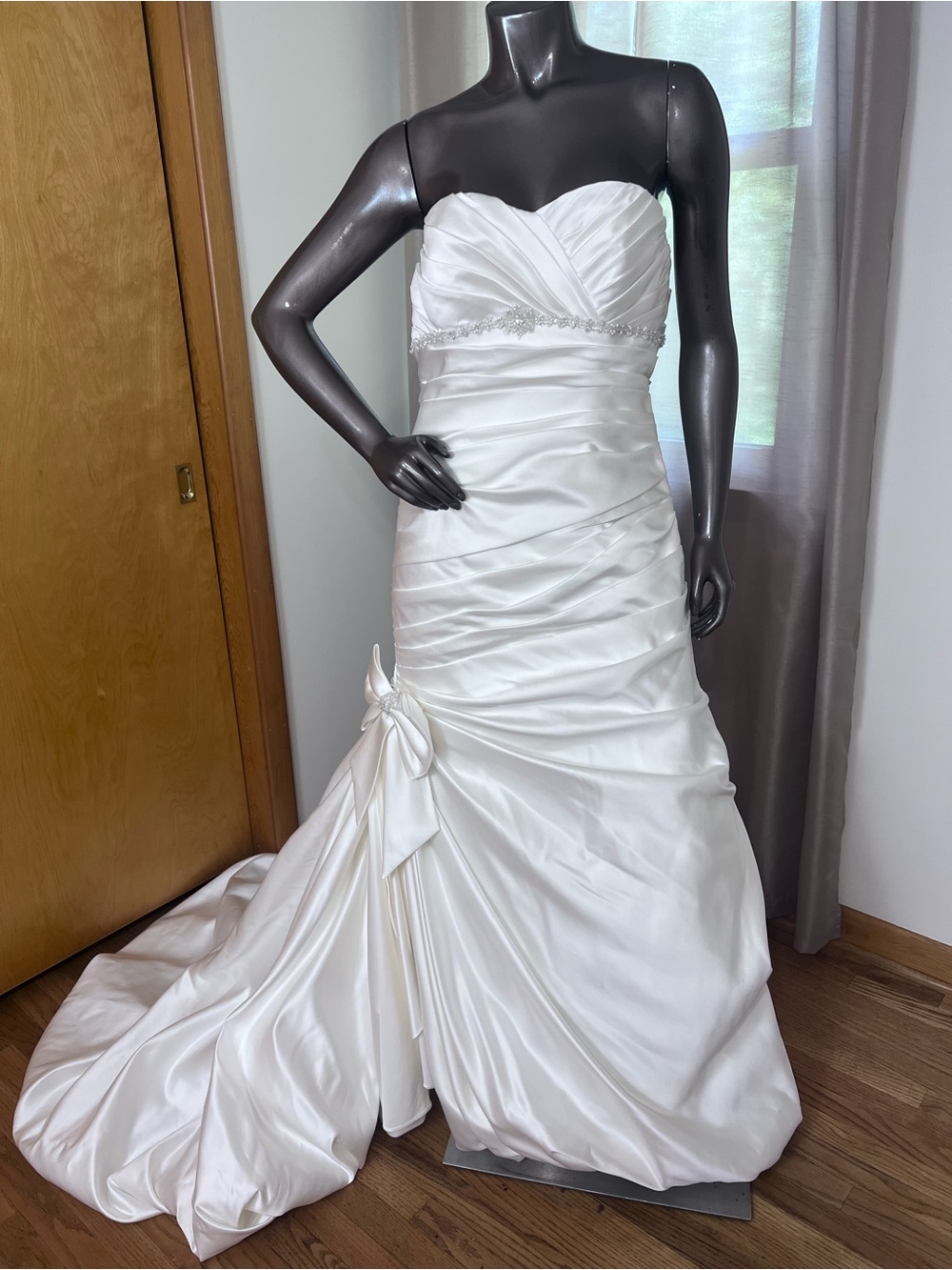 David's Bridal Ivory fit n flare wedding gown.